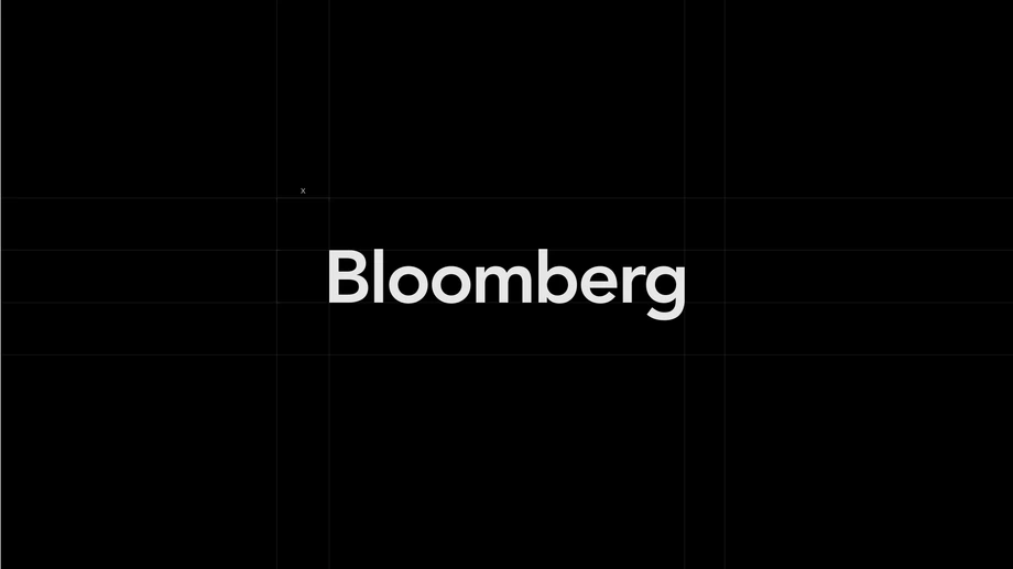 The Bloomberg wordmark centered on a black background with subtle construction lines.